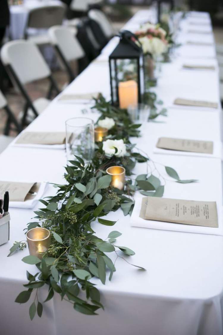 Dicas para decorar uma mesa de festa de casamento com muitas folhas